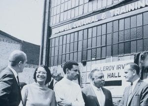 The founding of Bidwell Training Center in 1968, people stand outside a building 